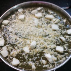 A picture of Cheez palak paneer.