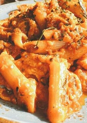 A picture of Red sauce pasta.