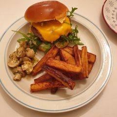 A picture of Burger with triple cooked chips.