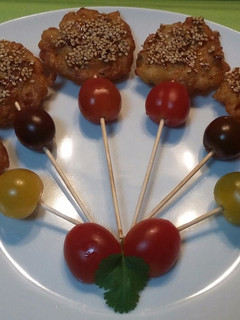 Una foto de Buñuelos de rape y piña