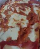 Lasagna con carne de cerdo y crepes de arvejas