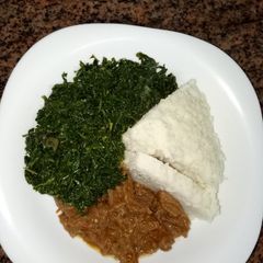A picture of Ugali, greens and beef for supper.