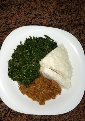 A picture of Ugali, greens and beef for supper.