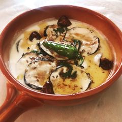 A picture of Baingan ka bharta#grilled brinjal (eggplant) in salty yougart.