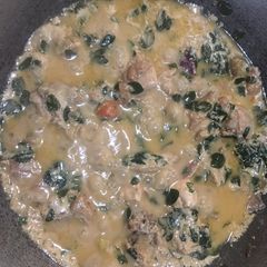 A picture of Chicken stew in coconut with miracle plant Malunggay.