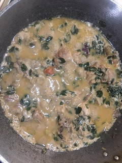 A picture of Chicken stew in coconut with miracle plant Malunggay.