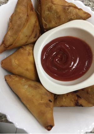 A picture of Chicken cheese Samosa.