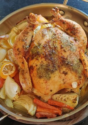 A picture of Herb Roasted Chicken with Gravy.