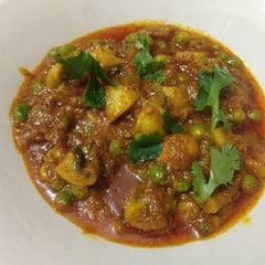 A picture of Mushroom Matar (peas) Masala.