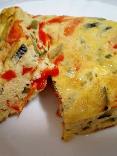 Una foto de Tortilla de calabacín y pimiento rojo