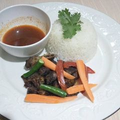 A picture of Fried beef with rice.