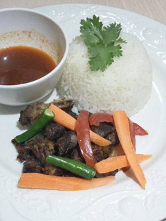 A picture of Fried beef with rice.