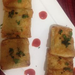 A picture of Chicken and potato patties.