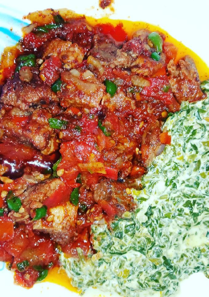 A picture of Wet fried beef with Traditional vegetables.