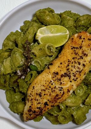 A picture of Creamy Cilantro and Thai Basil Pesto Macaroni with Lemon Pepper Fish Fillet.