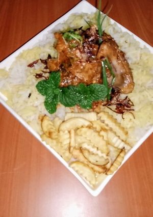 A picture of East African Swahili biryani 🧅🍅🌻🧂🧄🐔🥔.