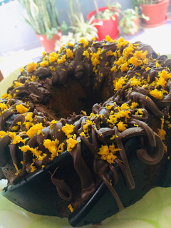 Una foto de BUDÍN DE #MANDARINA🍊CON 🍫CHOCOLATE 🍊🍩🧉🍊🍩☕️🍊🍩🧉