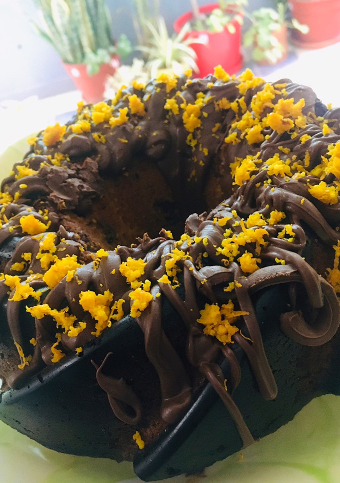 Una foto de BUDÍN DE #MANDARINA🍊CON 🍫CHOCOLATE 🍊🍩🧉🍊🍩☕️🍊🍩🧉