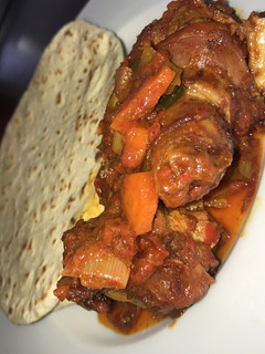 A picture of Chapati and veggies sauce.