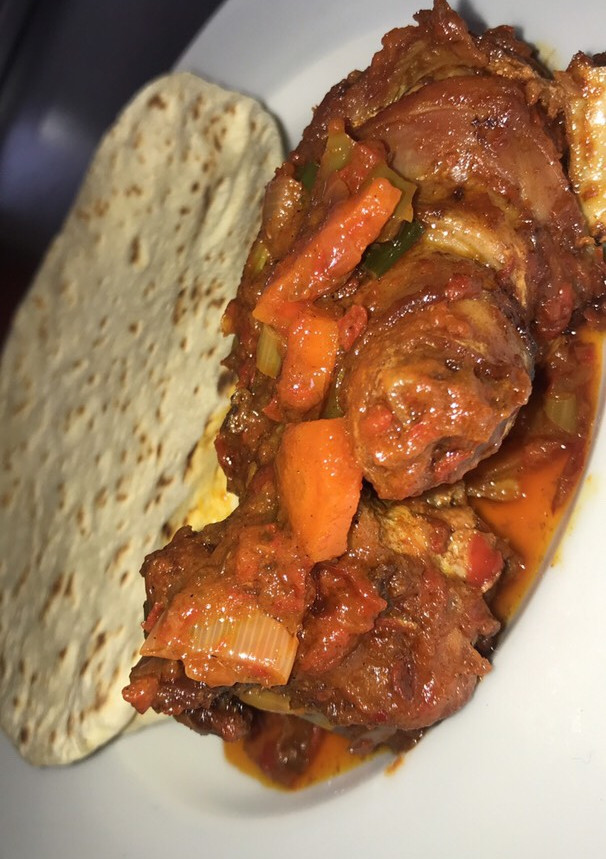 A picture of Chapati and veggies sauce.