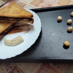 Nutella and Banana sandwich made in Air fryer A picture of Nutella and Banana sandwich made in Air fryer.