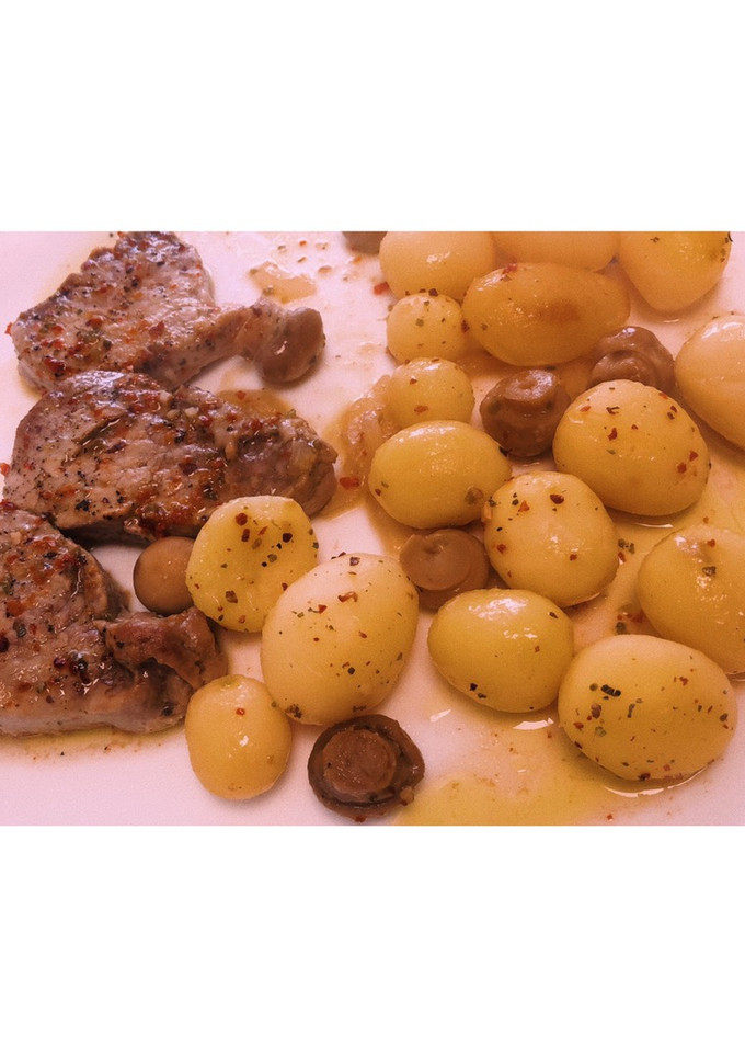 Una foto de Solomillo al horno con patatas