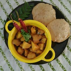A picture of Potato (with skin) curry.