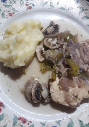 Una foto de Pollo al champignon