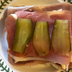 A picture of Prosciutto, Pié d’Angloys & Gherkin Open Sandwich.
