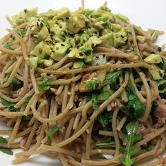 A picture of Spaghetti with tuna and avocado.