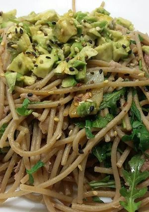 A picture of Spaghetti with tuna and avocado.
