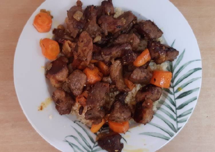 Cuscús de cordero y cerdo