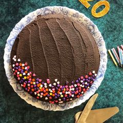 A picture of Wholewheat chocolate mud cake with chocolate ganache.