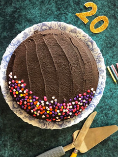 A picture of Wholewheat chocolate mud cake with chocolate ganache.