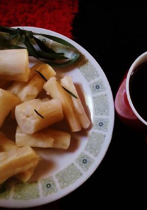 A picture of Boiled cassava and lemon grass tea.