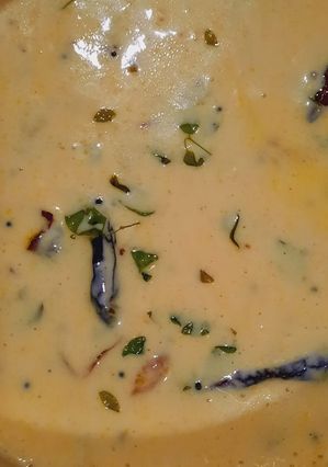 A picture of Moringa leaves in curd curry.