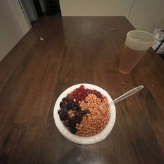 A picture of Baked Ham with Cranberry Jelly and Pork and Beans.
