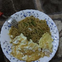 A picture of Fried Noodles and eggs.