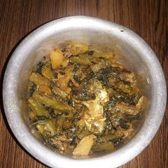 A picture of Hilsa fish Head with Malabar spinach | Side dish.