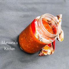 A picture of Pizza and pasta sauce.