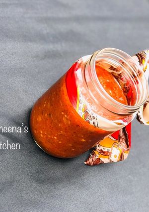 A picture of Pizza and pasta sauce.