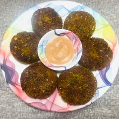 A picture of Lentil, cereal, chickpeas mixed patties.
