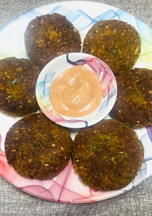 A picture of Lentil, cereal, chickpeas mixed patties.