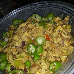A picture of Onion and egg masla.