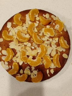 A picture of Brown sugar almond cake with a bit almond liqueur.