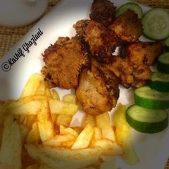 A picture of Fried Chicken with Fries 🍟.
