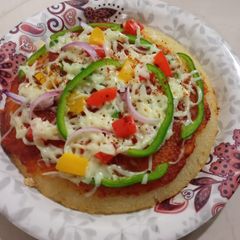 A picture of Sooji veg pizza.
