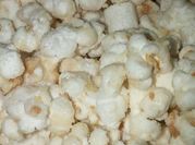 A picture of popcorn with white chocolate