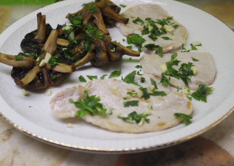 Lomo al grill con champiñones al horno