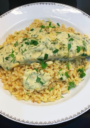 Une photo de Saumon sauce herbes & moutarde et blé